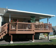 Patio cover over a wooden deck